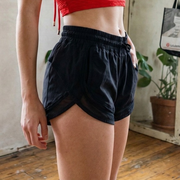 lululemon athletica Pants - Lululemon Hotty Hot Shorts Womens 6 Black Mesh Trim Running Gym FLAWED